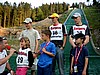 Simon Ammann (Szwajcaria), Michael Uhrmann (Niemcy) i Veli-Matti Lindstroem (Finlandia) podczas ceremoni wręczenia numerów startowych
