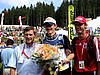 Adam Małysz (Polska) pozuje do zdjęć, po prawej trener polskiej kadry Heinz Kuttin (Austria)