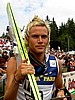 Bjoern Einar Romoeren (Norwegia) pozuje do zdjęcia