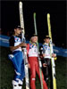 Podium zawodów w Predazzo. Od lewej: Martin Hoellwarth (Austria), Akseli Kokkonen (Finlandia), Veli-Matti Lindstroem (Finlandia)