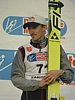 Adam Małysz (Polska) na podium