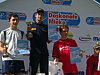 Maciej Kot (Polska) z kolegami na podium